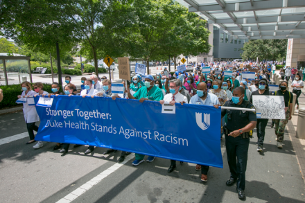 Duke Health employees march together photo