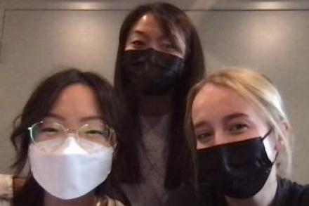 photo of three girls wearing a mask