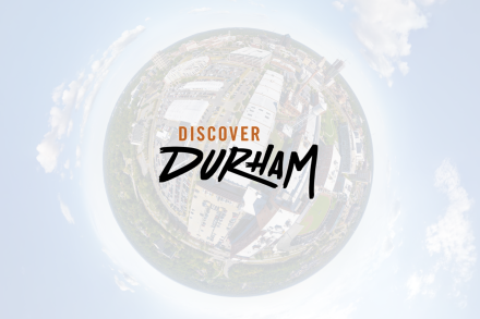 Discover durham logo over a globe