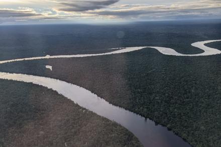 View of the Amazon River through an airplane window