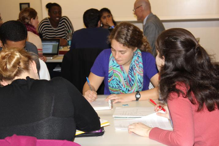 student writing in class