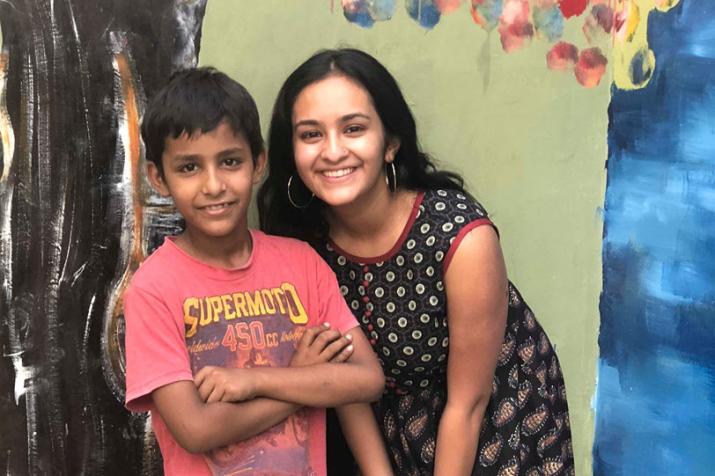 Posing alongside one voice in the chorus that greeted me with “Hi, Didi!” on our first days at Udayan Care