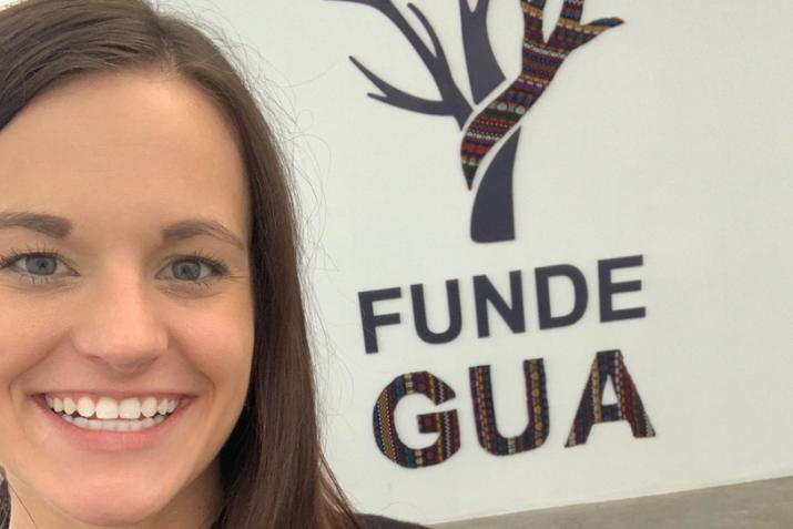 Kelsey Landrum stands in front of FUNDEGUA, one of the organizations that she and her research group collaborate with in Guatemala City. 