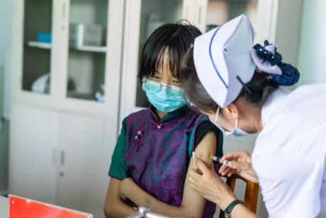 Patient receiving HPV vaccine in China