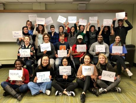 Students_in_Fieldwork_Preparation_Class_Hold_Country_Signs