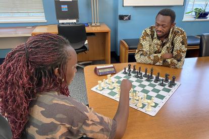 Ben Mukumbya teaches chess 