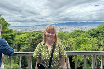 Jane Claire Anderson with Kyoto, Japan in the background