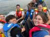 Daniel Lee and team on canoe in Uganda